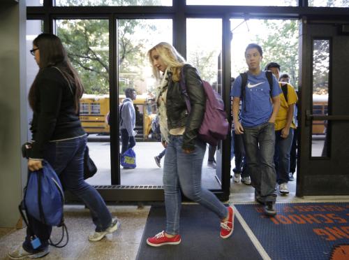 Students walk the halls at Whitney Young High School in Chicago.