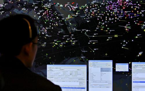 A vessel traffic management operator guides vessels at the Port Operations Control Centre at Changi Naval Base in Singapore