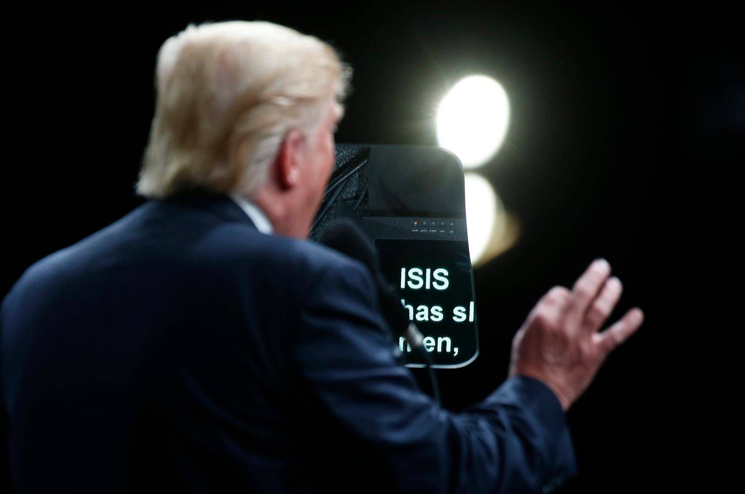 The word Isis is pictured on a teleprompter as Republican presidential nominee Donald Trump speaks at a campaign event in Selma, North Carolina, U.S. November 3, 2016. REUTERS/Carlo Allegr