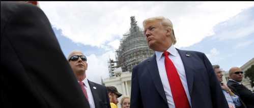 U.S. Republican presidential candidate Donald Trump arrives to address a Tea Party rally against the Iran nuclear deal at the U.S. Capitol in Washington September 9, 2015. REUTERS/Jonathan Ernst - RTSDEW
