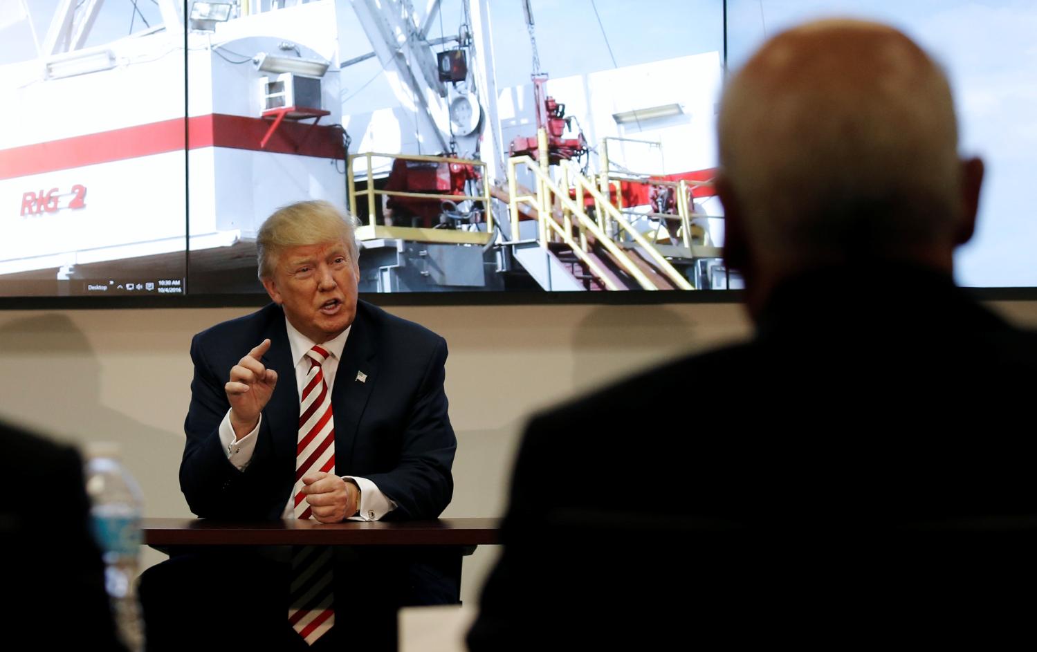 Then-U.S. Republican presidential nominee Donald Trump meets with energy executives during a campaign stop in Denver, Colorado.