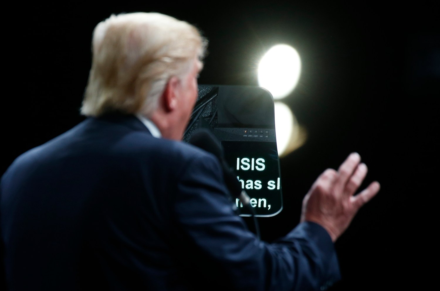 The word Isis is pictured on a teleprompter as Republican presidential nominee Donald Trump speaks at a campaign event in Selma, North Carolina, U.S. November 3, 2016. REUTERS/Carlo Allegri - RTX2RTWS