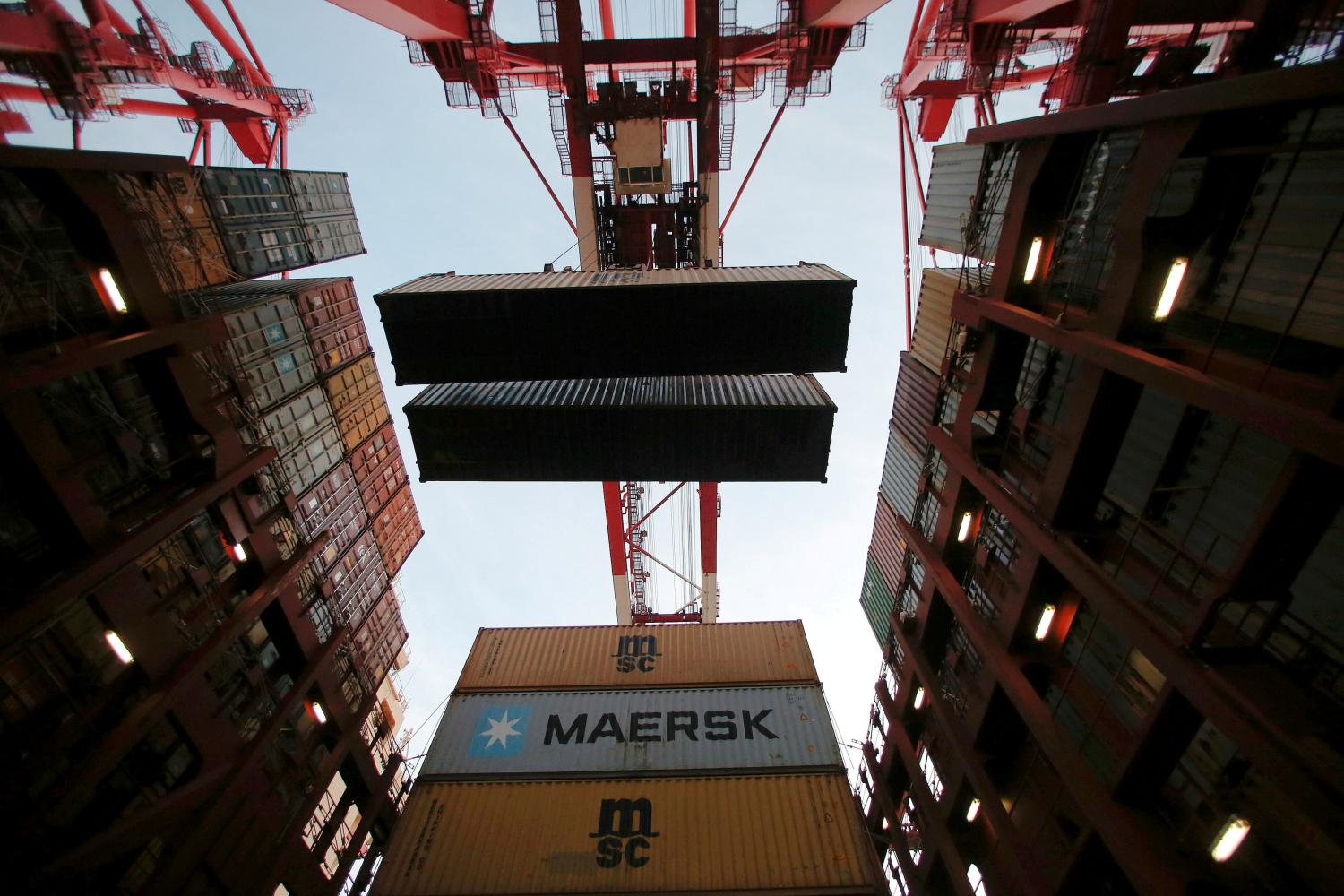 Containers are seen unloaded from the Maersk's Triple-E giant container ship Maersk Majestic, one of the world's largest container ships, at the Yangshan Deep Water Port, part of the Shanghai Free Trade Zone, in Shanghai, China, September 24, 2016. Picture taken September 24, 2016. REUTERS/Aly Song - RTSS0CS