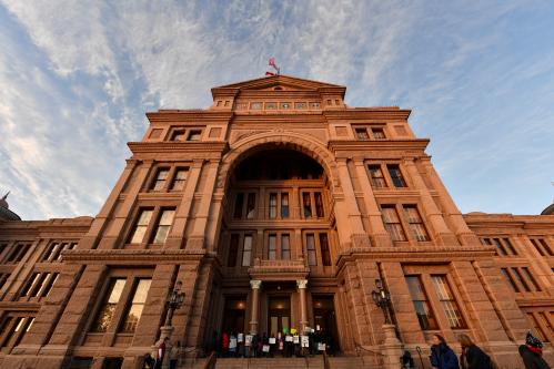 Activists demonstrate against U.S. President-elect Donald Trump outside the Texas State Capitol in Austin, one day ahead of the meetings of the Electoral College in the U.S. Stuart Butler argues that business will get a boost under a Trump presidency in realigning higher education with what is needed in the workforce.