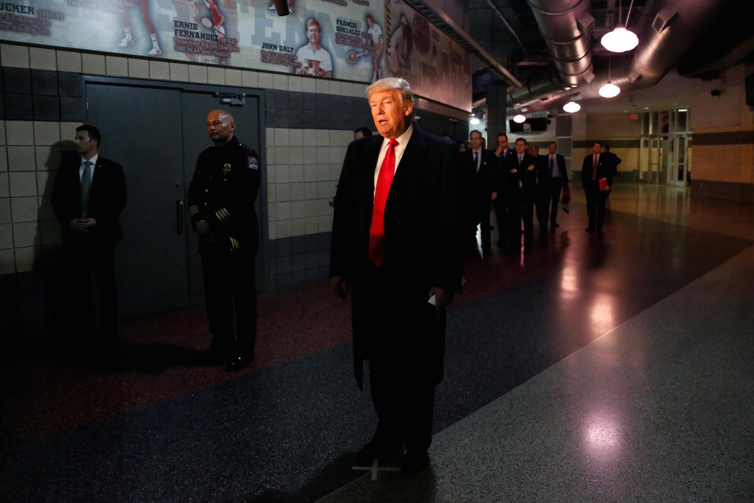 U.S. President-elect Donald Trump speaks with the media after meeting with families of the victims of the November 28 attacks at Ohio State University in The Jerome Schottenstein Center in Columbus, Ohio, U.S., December 8, 2016. REUTERS/Shannon Stapleton - RTSVBBQ