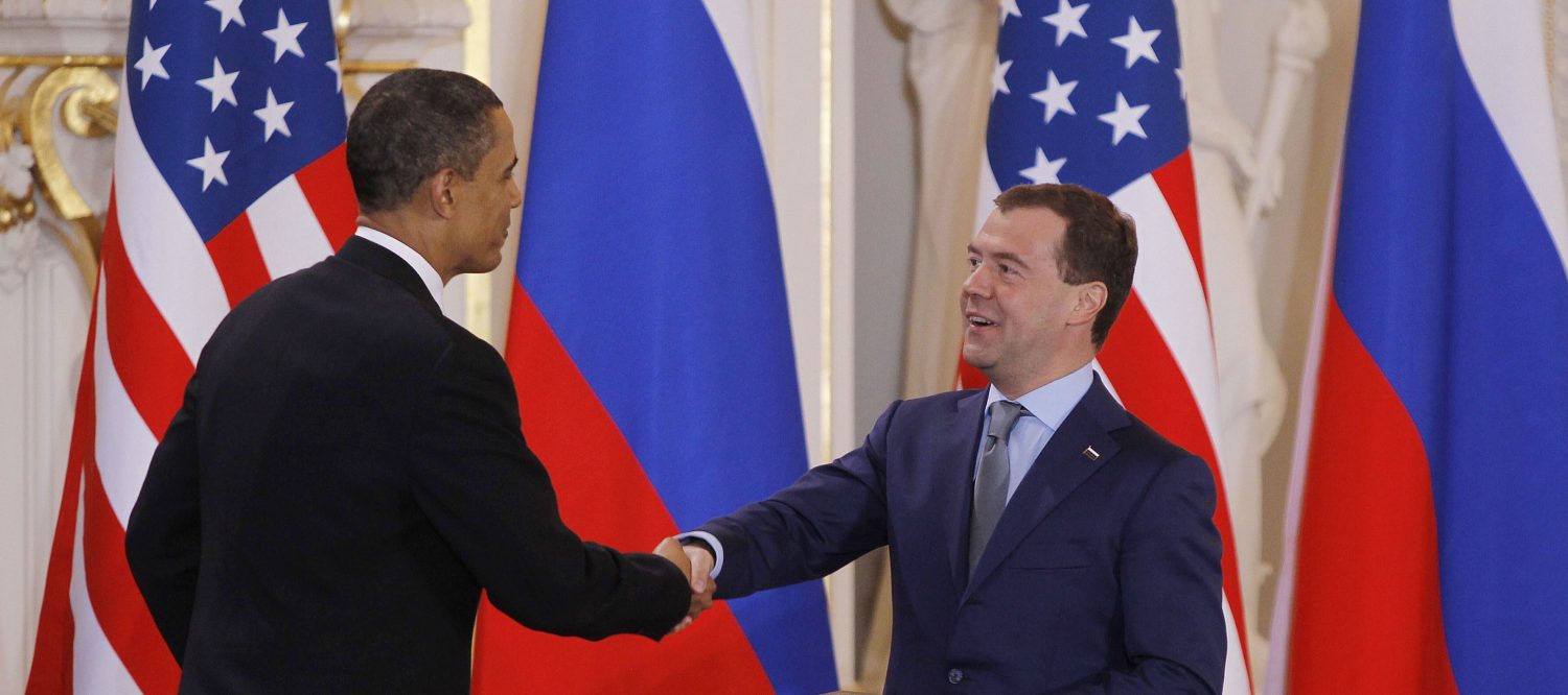 U.S. President Barack Obama (L) and Russian President Dmitry Medvedev (R) shake hands after signing the new Strategic Arms Reduction Treaty (START II) at Prague Castle in Prague, April 8, 2010. REUTERS/Jason Reed (CZECH REPUBLIC - Tags: POLITICS MILITARY) - RTR2CK50