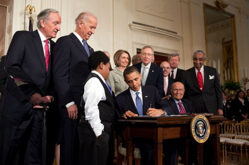 Obama signs health care law