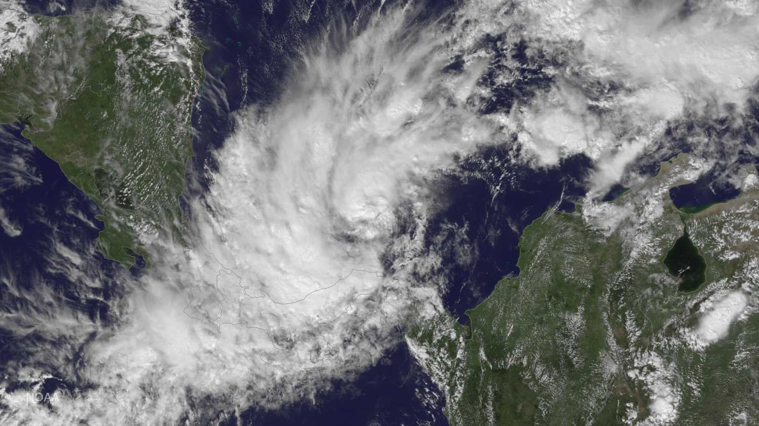 Tropical Storm Otto is pictured forming approximately 175 miles east-southeast of San Andreas Island in the Caribbean Sea in this November 21, 2016 satellite handout photo. NOAA/Handout via REUTERS ATTENTION EDITORS - THIS IMAGE WAS PROVIDED BY A THIRD PARTY. EDITORIAL USE ONLY - RTSSP2D