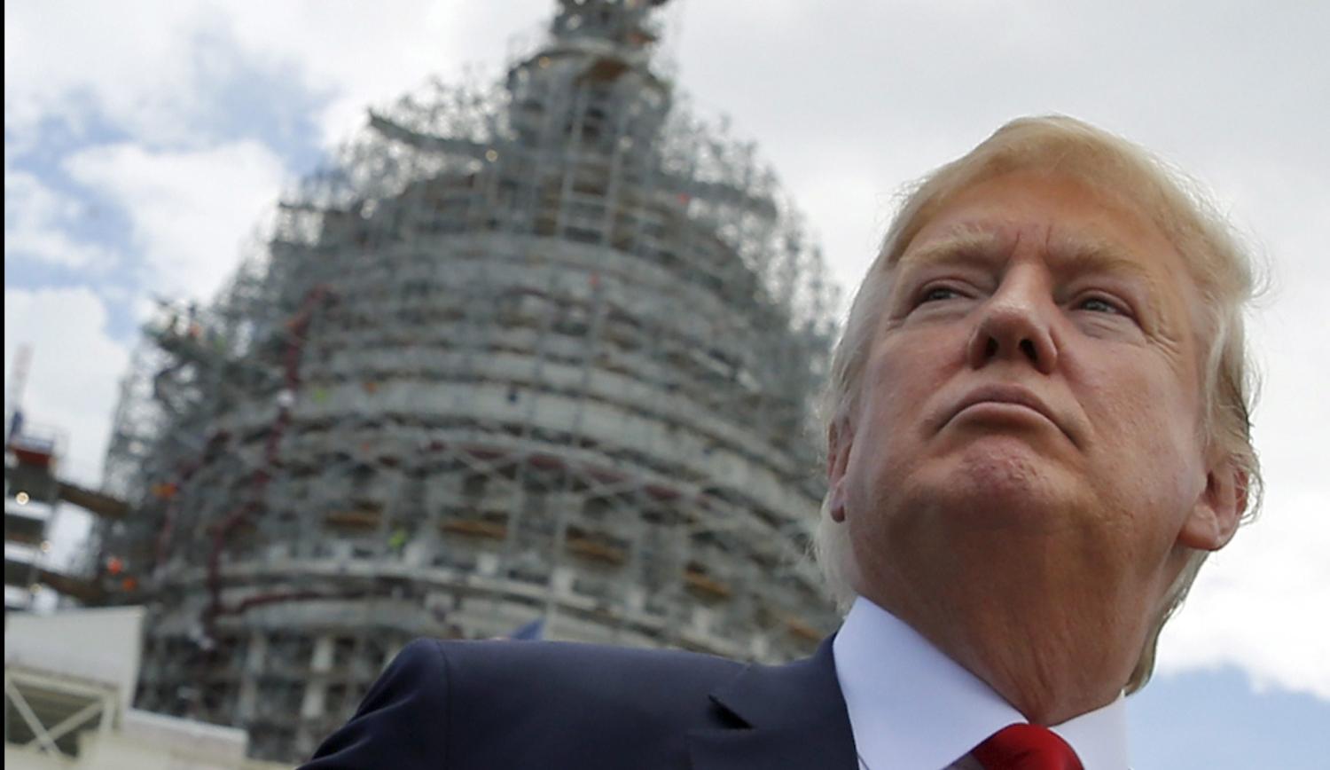 U.S. Republican presidential candidate Donald Trump arrives to address a Tea Party rally against the Iran nuclear deal at the U.S. Capitol in Washington September 9, 2015. REUTERS/Jonathan Ernst - RTSDQ0