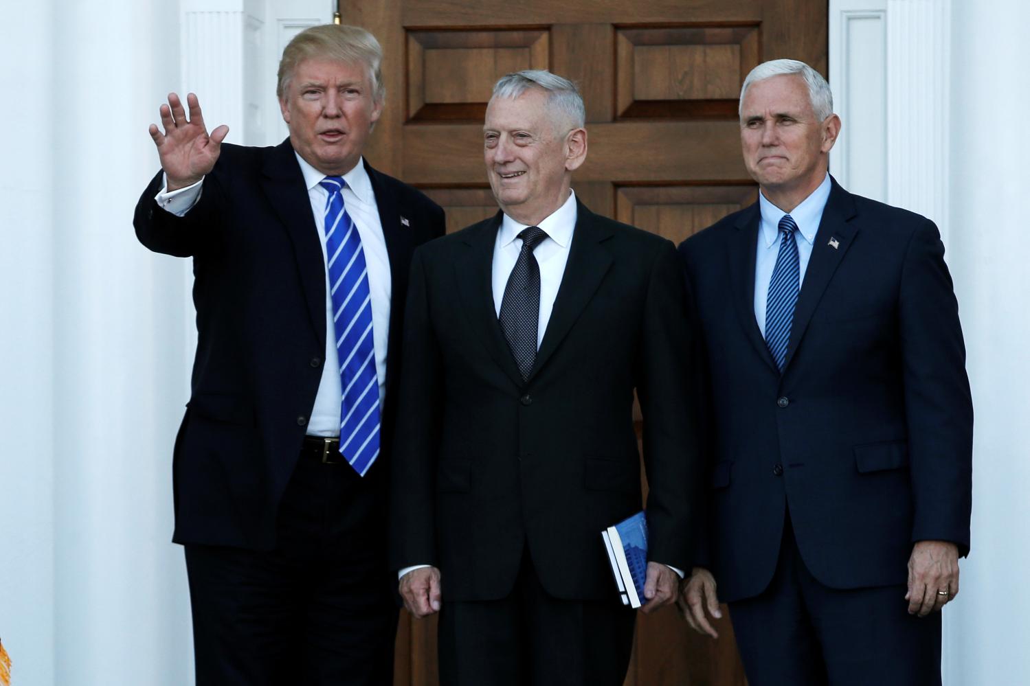 U.S. President-elect Donald Trump (L) and Vice President-elect Mike Pence (R) greet retired Marine General James Mattis for a meeting at the main clubhouse at Trump National Golf Club in Bedminster, New Jersey, U.S., November 19, 2016. REUTERS/Mike Segar - RTSSFDG