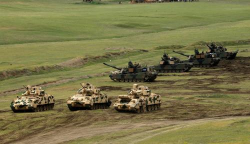 U.S. M1A2 "Abrams" tanks and Bradley infantry fighting vehicles are seen during U.S. led joint military exercise "Noble Partner 2016" near Vaziani, Georgia, May 18, 2016. REUTERS/David Mdzinarishvili - RTSETMF