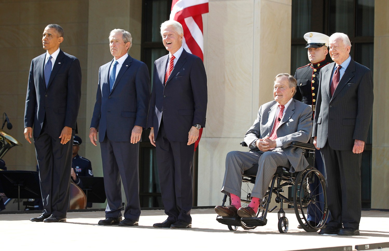 (From L - R) U.S. President Barack Obama stands alongside former presidents George W. Bush, Bill Clinton, George H.W. Bush and Jimmy Carter as they attend the dedication ceremony for the George W. Bush Presidential Center in Dallas, April 25, 2013. Obama is in Texas to stand shoulder-to-shoulder with former President George W. Bush in what could serve as a powerful reminder of the ongoing struggle against terrorism, from the Sept. 11 attacks to the Boston Marathon bombings. REUTERS/Jason Reed (UNITED STATES - Tags: POLITICS) - RTXYZPF