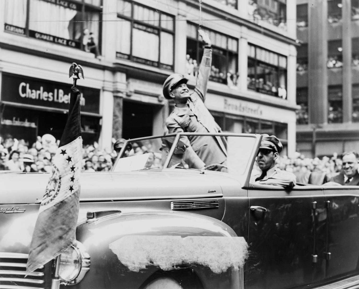General Dwight Eisenhower waving to the crowd