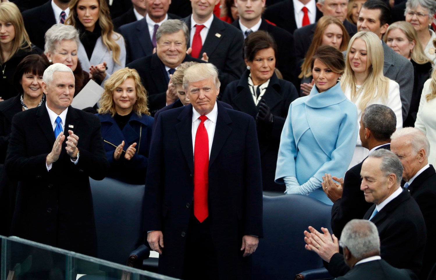 Donald Trump receives applause during his inauguration ceremonies to be sworn in as the 45th president of the United States at the U.S. Capitol in Washington, U.S., January 20, 2017. REUTERS/Lucy Nicholson - RTSWI5P