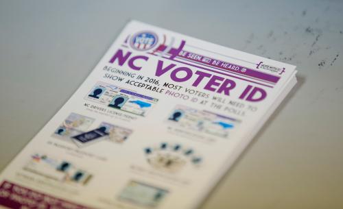 For USA-ELECTION/VOTING-NORTHCAROLINA [moving at 0600 EDT (1000 GMT) Friday, July 15, 2016]A pile of government pamphlets explaining North Carolina's controversial "Voter ID" law sits on table at a polling station as the law goes into effect for the state's presidential primary in Charlotte, North Carolina, U.S. on March 15, 2016. REUTERS/Chris Keane/File Photo - RTSI0CT