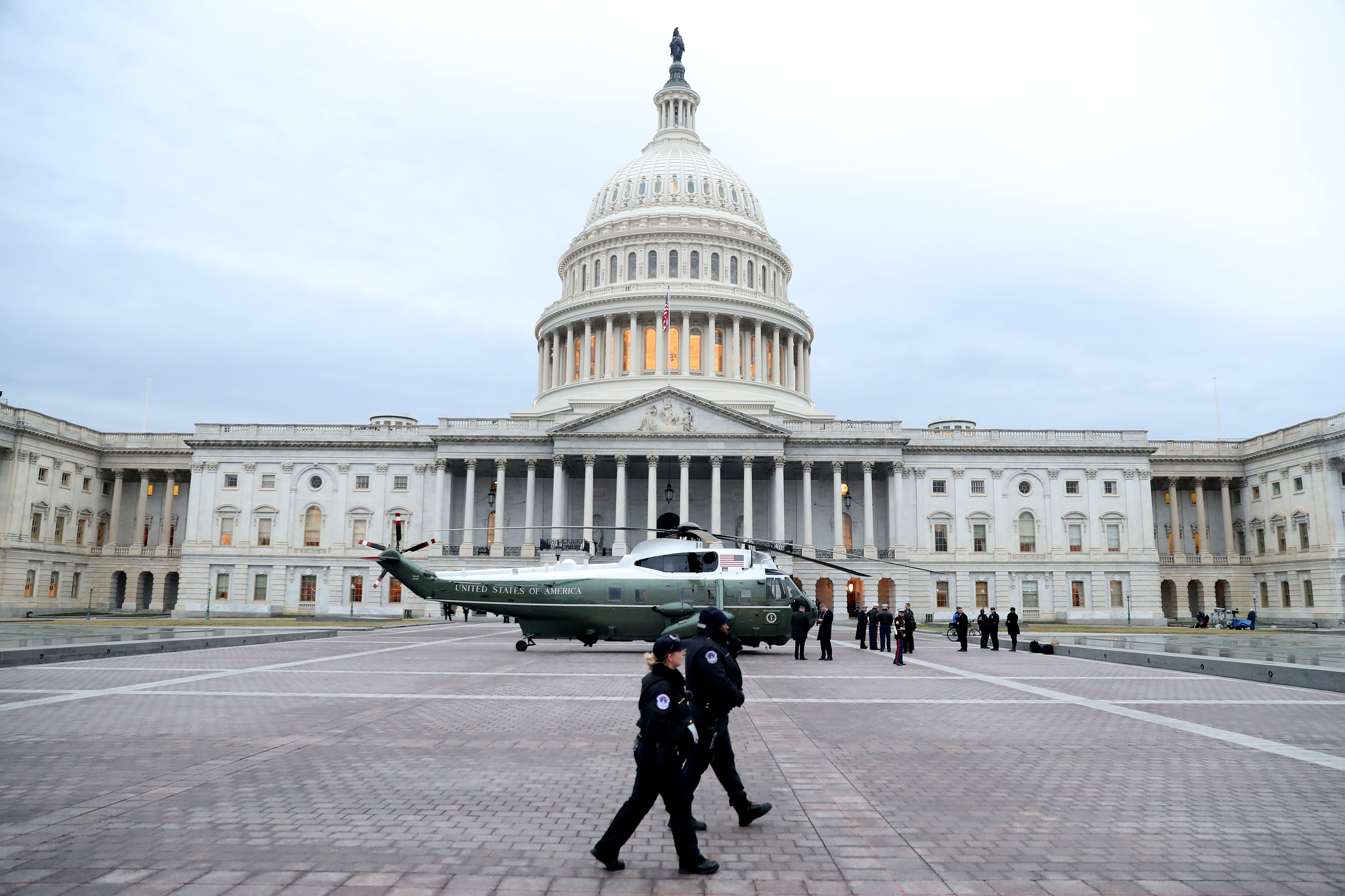 A military helicopter lands at the U.S. Capitol in Washington, DC, U.S., January 20, 2017. In today's inauguration ceremony Donald J. Trump becomes the 45th president of the United States. REUTERS/Rob Carr/Pool - RTSWGJK
