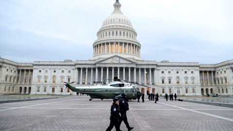 A military helicopter lands at the U.S. Capitol in Washington, DC, U.S., January 20, 2017. In today's inauguration ceremony Donald J. Trump becomes the 45th president of the United States. REUTERS/Rob Carr/Pool - RTSWGJK