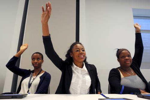 High school students from the City on a Hill Charter Public School, playing the role of U.S. senators, cast a vote at the Edward M. Kennedy Institute in Boston