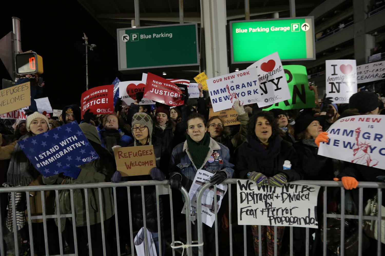 QUALITY REPEAT - Protesters gather outside Terminal 4 at JFK airport in opposition to U.S. president Donald Trump's proposed ban on immigration in Queens, New York City, U.S., January 28, 2017. REUTERS/Stephen Yang - RTSXULV