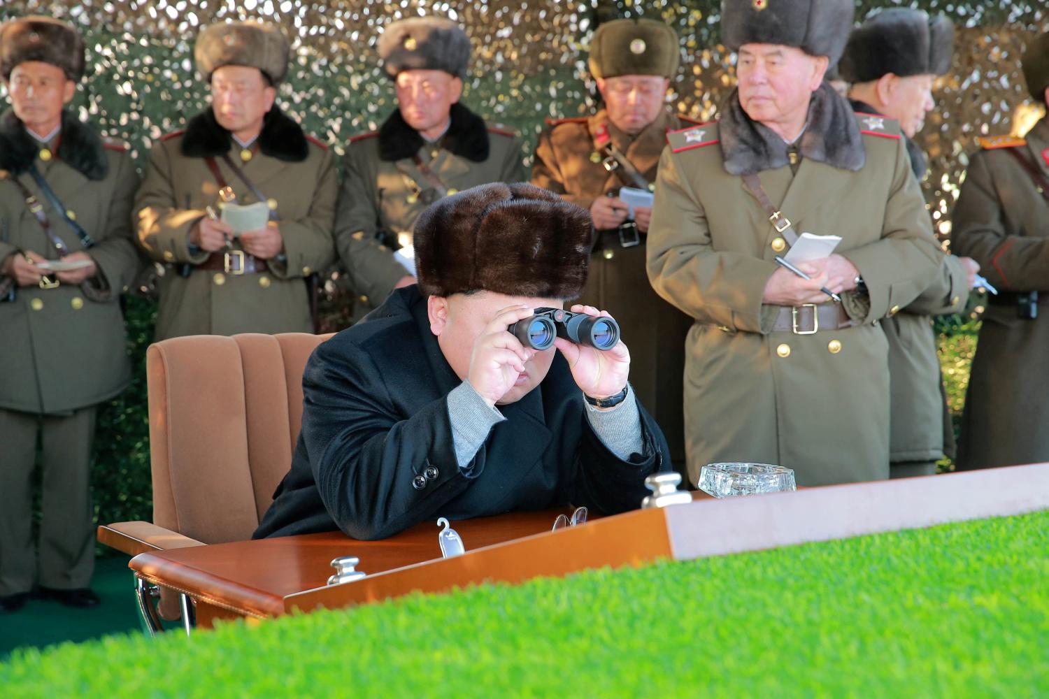 North Korean leader Kim Jong Un guides a firing contest among multiple launch rocket system (MLRS) batteries selected from large combined units of the KPA, in this undated photo released by North Korea's Korean Central News Agency (KCNA) in Pyongyang on December 21, 2016. KCNA/via Reuters ATTENTION EDITORS - THIS PICTURE WAS PROVIDED BY A THIRD PARTY. REUTERS IS UNABLE TO INDEPENDENTLY VERIFY THE AUTHENTICITY, CONTENT, LOCATION OR DATE OF THIS IMAGE. FOR EDITORIAL USE ONLY. NO THIRD PARTY SALES. SOUTH KOREA OUT. THIS PICTURE IS DISTRIBUTED EXACTLY AS RECEIVED BY REUTERS, AS A SERVICE TO CLIENTS. TPX IMAGES OF THE DAY - RTX2VYJG