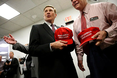 REUTERS/Jonathan Ernst - U.S. Representatives John Mica (R-FL) and Pete Sessions (R-TX) show off their “Make America Great Again” hats, illustrating Donald Trump’s support among the majority party in Congress.