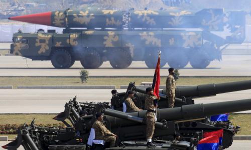 A Hatf-VI (Shaheen-II) missile (background) is displayed during the Pakistan Day parade in Islamabad March 23, 2015. Pakistan held its first Republic Day parade in seven years on Monday, full of flag-waving pomp and aerial military expertise, a symbolic show of strength in the war against the Taliban months after a militant attack on a school killed 132 children. Pakistan Day commemorates March 23, 1940, when the Muslim League demanded the establishment of separate nations to protect Muslims in the then British colony of India. REUTERS/Faisal Mahmood - RTR4UI23