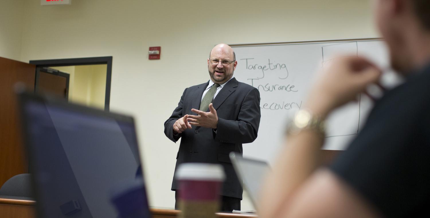 George Washington University Law professor Marc Mayerson speaks to a class.