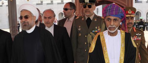 Oman's Sultan Qaboos bin Said (R) walks with Iran's President Hassan Rouhani upon Rouhani's arrival in Muscat March 12, 2014. REUTERS/Sultan Al Hasani (OMAN - Tags: POLITICS ROYALS) - RTR3GQAH