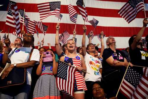 Supporters of Democratic U.S. presidential candidate Hillary Clinton cheer during her California primary night rally held in the Brooklyn borough of New York