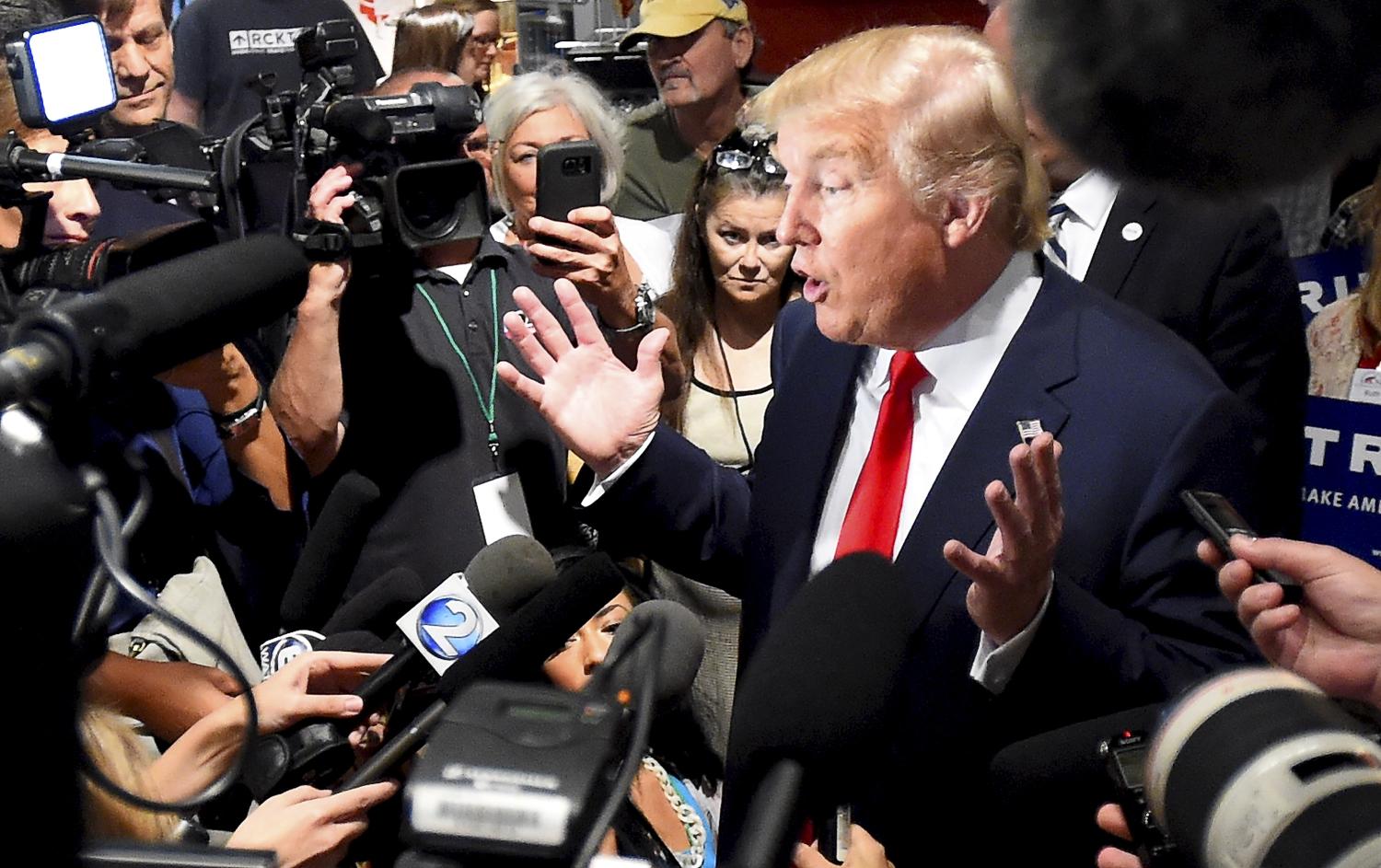 Republican presidential candidate Donald Trump speaks to the media during the National Federation of Republican Assemblies at Rocketown in Nashville, Tennessee August 29, 2015. REUTERS/Harrison McClary - RTX1Q7TE