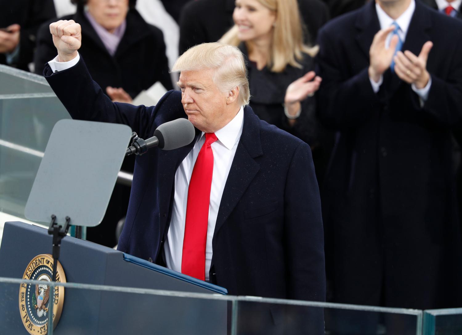 U.S. President Donald Trump gestures as he speaks after being sworn in as the 45th president of the United States on the West front of the U.S. Capitol in Washington, U.S., January 20, 2017. REUTERS/Lucy Nicholson
