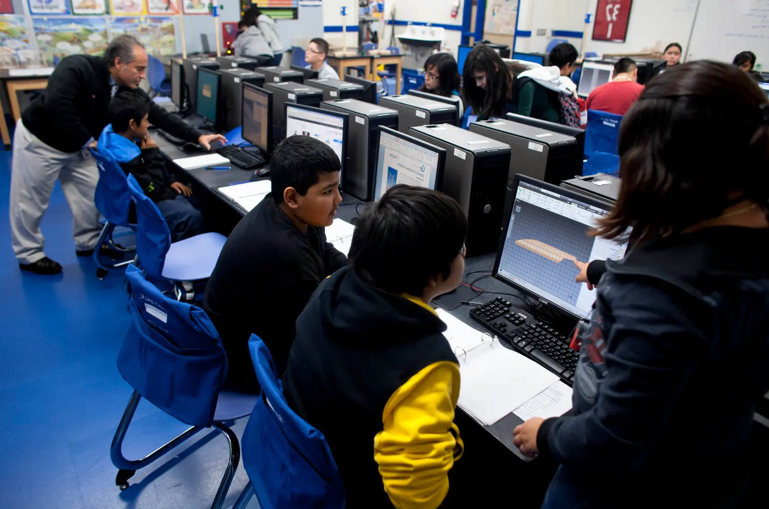 Armando Dominguez teaches 7th and 8th grade students as they participate in the bilingual, project lead the way class at Vieau Middle School in Milwaukee Wisconsin