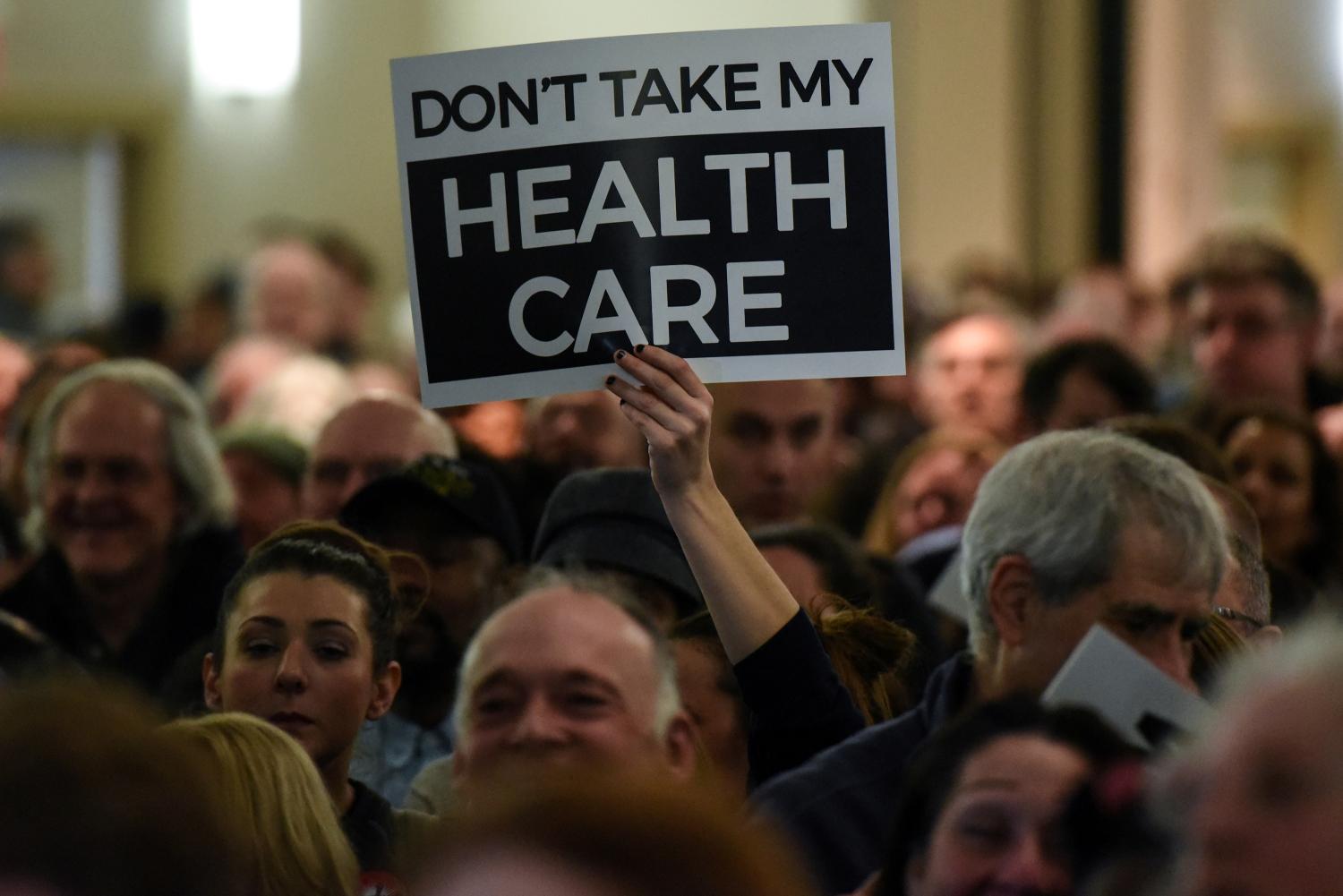 People demonstrate for the Affordable Care Act and against Trump during the First Stand Rally in Newark, N.J., U.S. January 15, 2017. REUTERS/Stephanie Keith - RTSVN4L