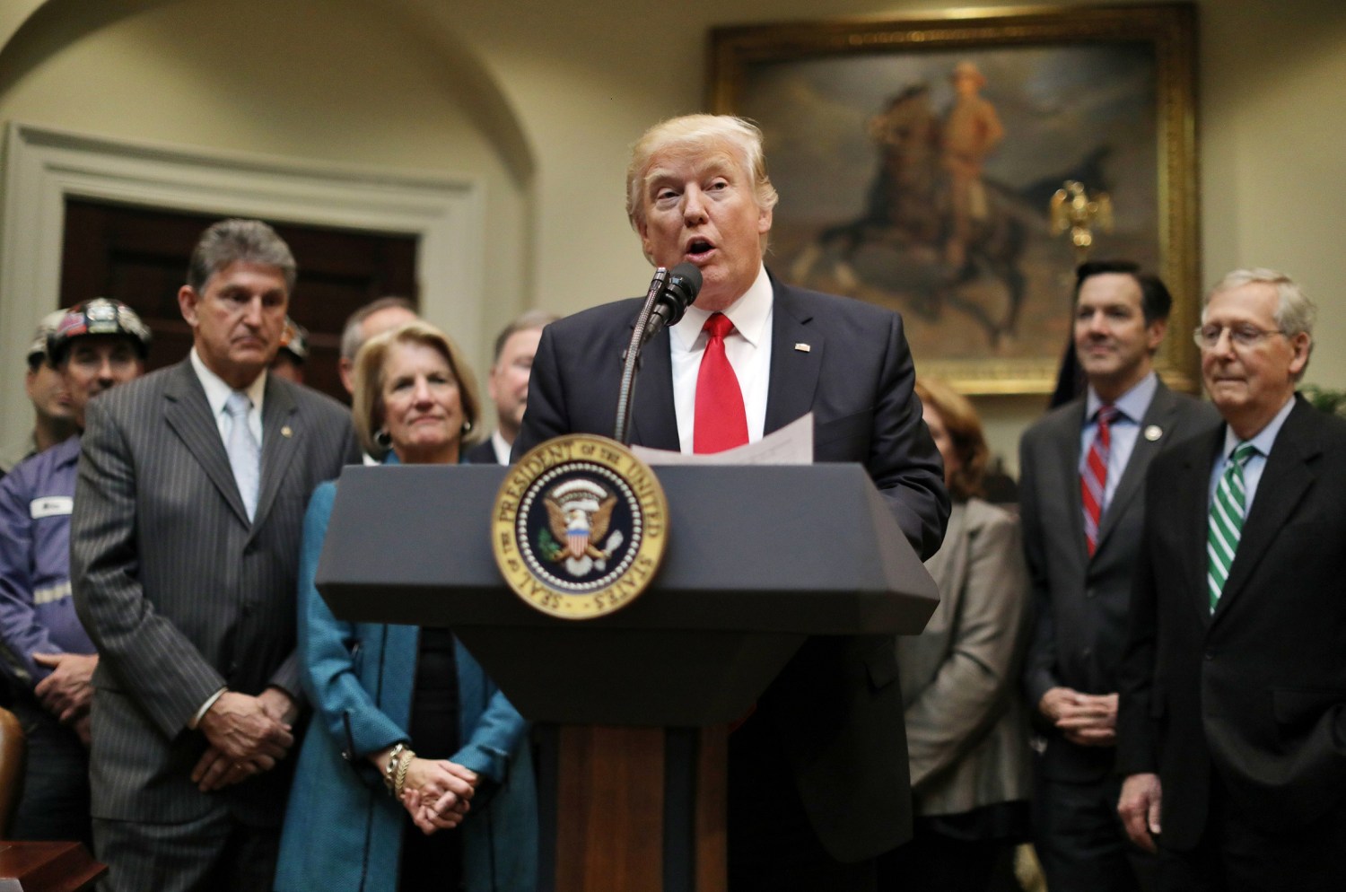 U.S. President Donald Trump speaks during the signing of H.J. Resolution 38, nullfies the stream protection rule, at the White House in Washington, U.S., February 16, 2017. REUTERS/Carlos Barria - RTSZ1RF