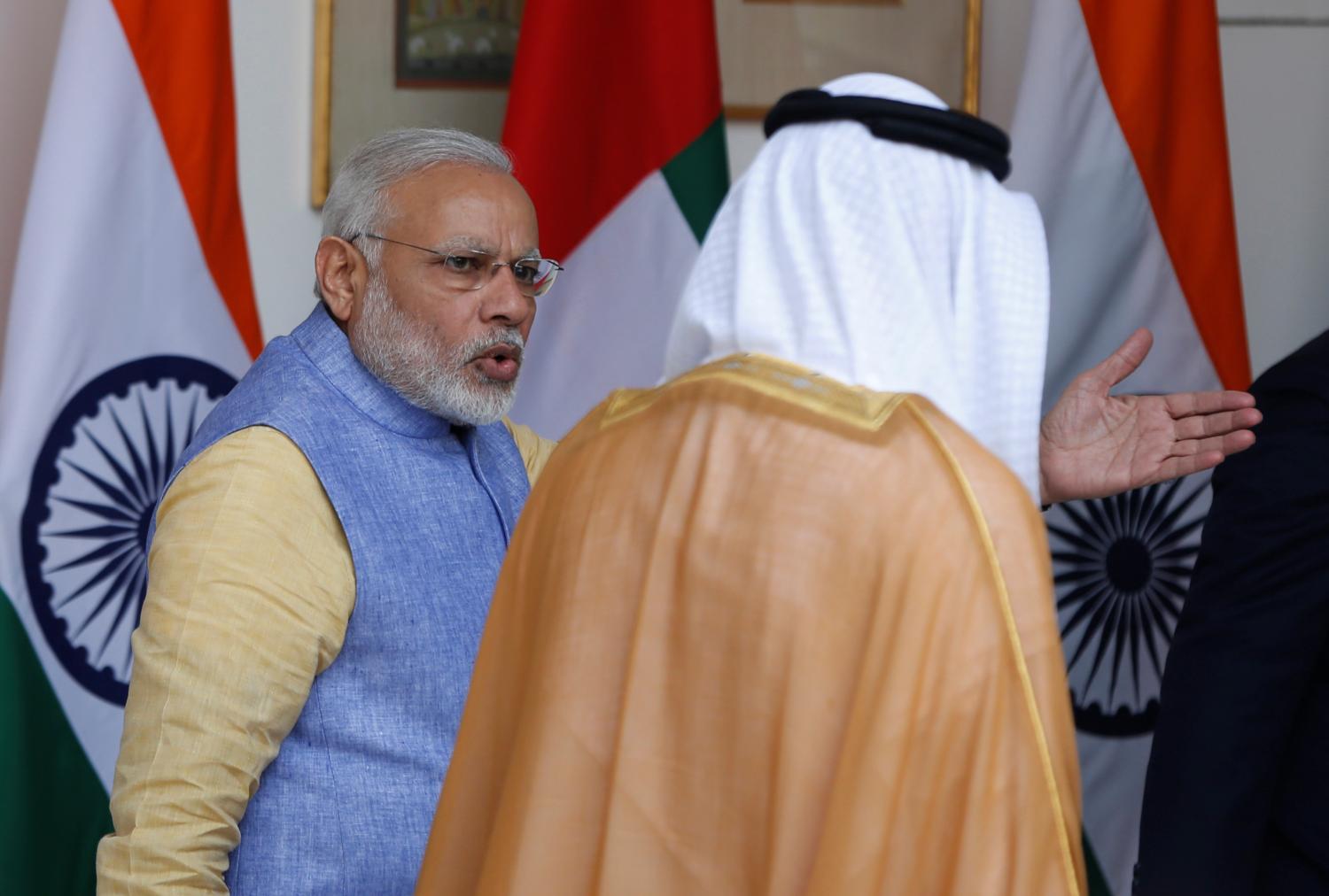 Sheikh Mohammed bin Zayed al-Nahyan, Crown Prince of Abu Dhabi and UAE's deputy commander-in-chief of the armed forces, and India's Prime Minister Narendra Modi (L) arrive for a photo opportunity ahead of their meeting at Hyderabad House in New Delhi, India, January 25, 2017. REUTERS/Adnan Abidi