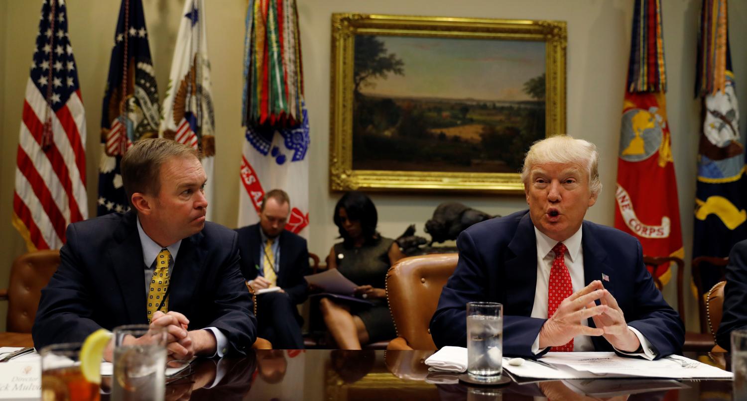Trump sitting with Director of Management and Budget