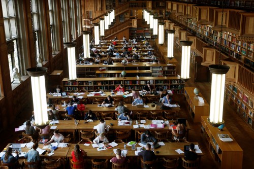 Students sit in the library of the university KU Leuven in Leuven