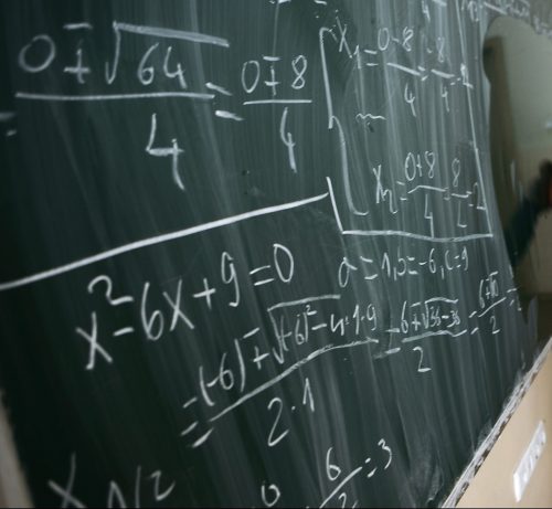 A blackboard with math equations