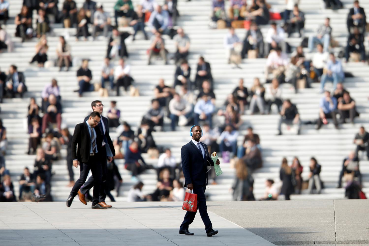 Businessmen enjoy the good weather.