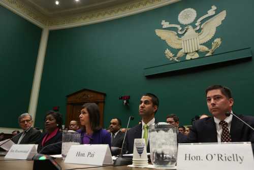 (L-R) FCC Chairman Tom Wheeler, Commissioners Mignon Clyburn, Jessica Rosenworcel, Ajit Pai, andr Mike O'Rielly testify before the House Communications and Technology panel on Capitol Hill in Washington December 12, 2013. REUTERS/Gary Cameron