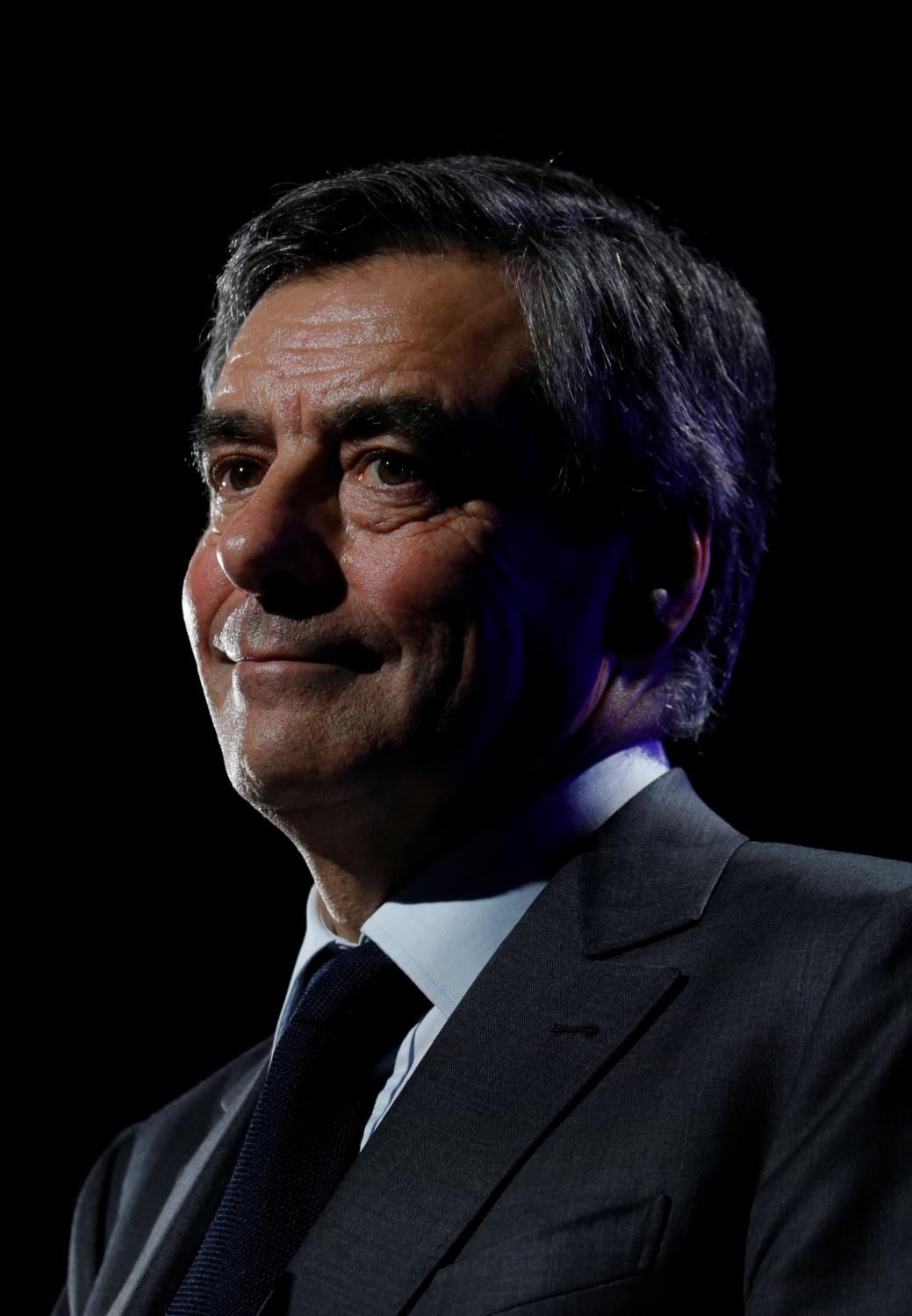 Francois Fillon, former French Prime Minister, member of the Republicans political party and 2017 presidential election candidate of the French centre-right delivers a speech at a campaign rally in Caen, France March 16, 2017. REUTERS/Philippe Wojazer - RTX31DF4