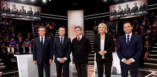 French presidential election candidates (LtoR) Francois Fillon, Emmanuel Macron, Jean-Luc Melenchon, Marine Le Pen and Benoit Hamon, pose before a debate organised by French private TV channel TF1 in Aubervilliers, outside Paris, France, March 20, 2017. REUTERS/Patrick Kovarik/Pool - RTX31WPR