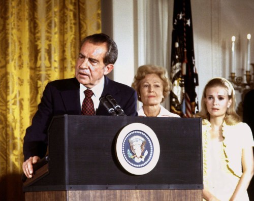 U.S. President Richard Nixon (L), listened to by First lady Pat Nixon and daughter Tricia Nixon (R), says goodbye to family and staff in the White House East Room on August 9, 1974. On Monday it will be 25 years since Nixon resigned his office, or "resigned in disgrace" as many of the news accounts would say, as it became clear the House of Representatives would impeach him for Watergate misdeeds and the Senate would follow by convicting him. In the quarter century since that day, historians, politicians and Nixon himself until he died on April 22, 1994, have argued his legacy and how his resignation -- the first by an American president -- changed the highest office in the land. - RTXJ4K6