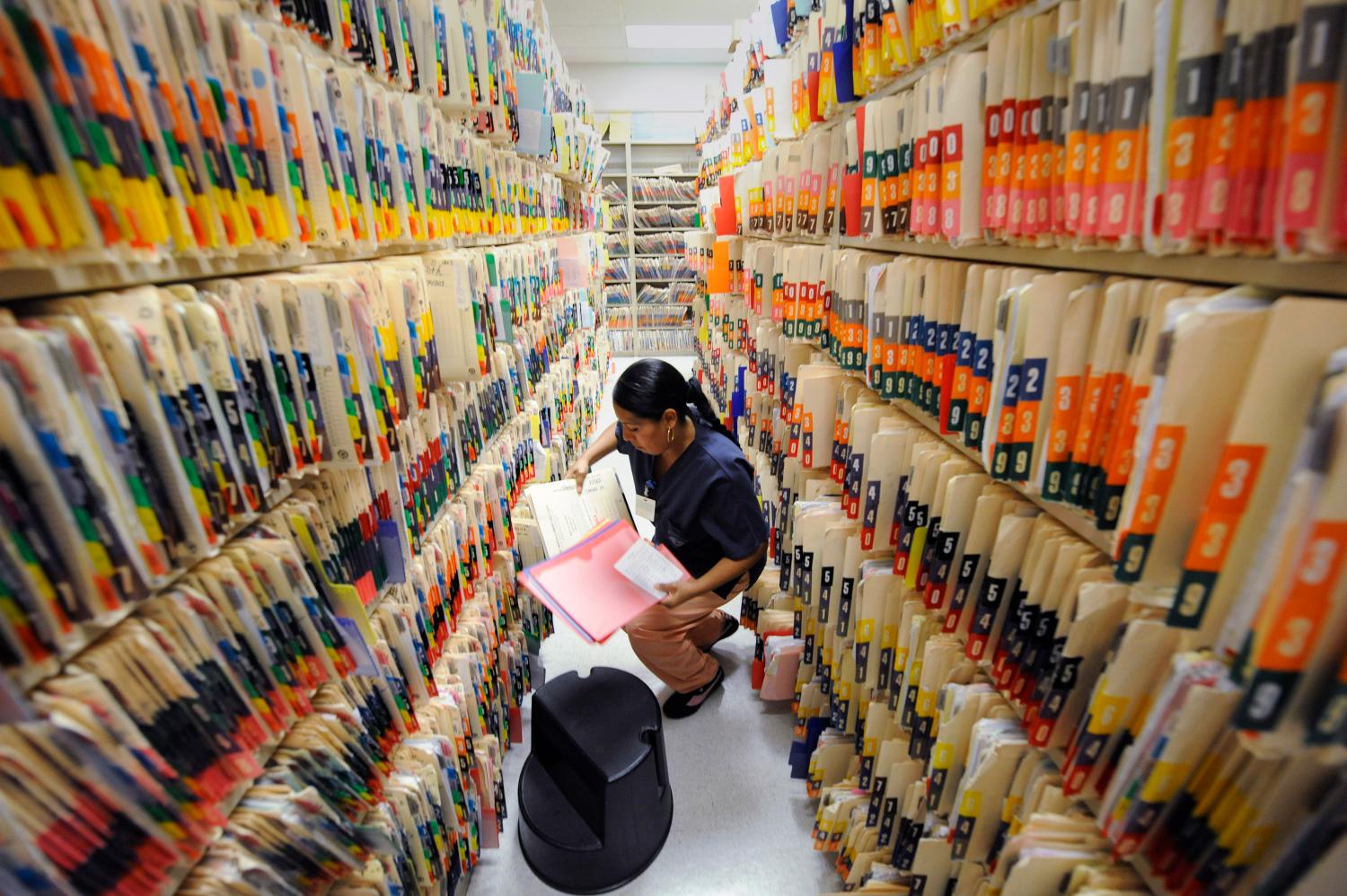 Medical records clerk working in a community health center