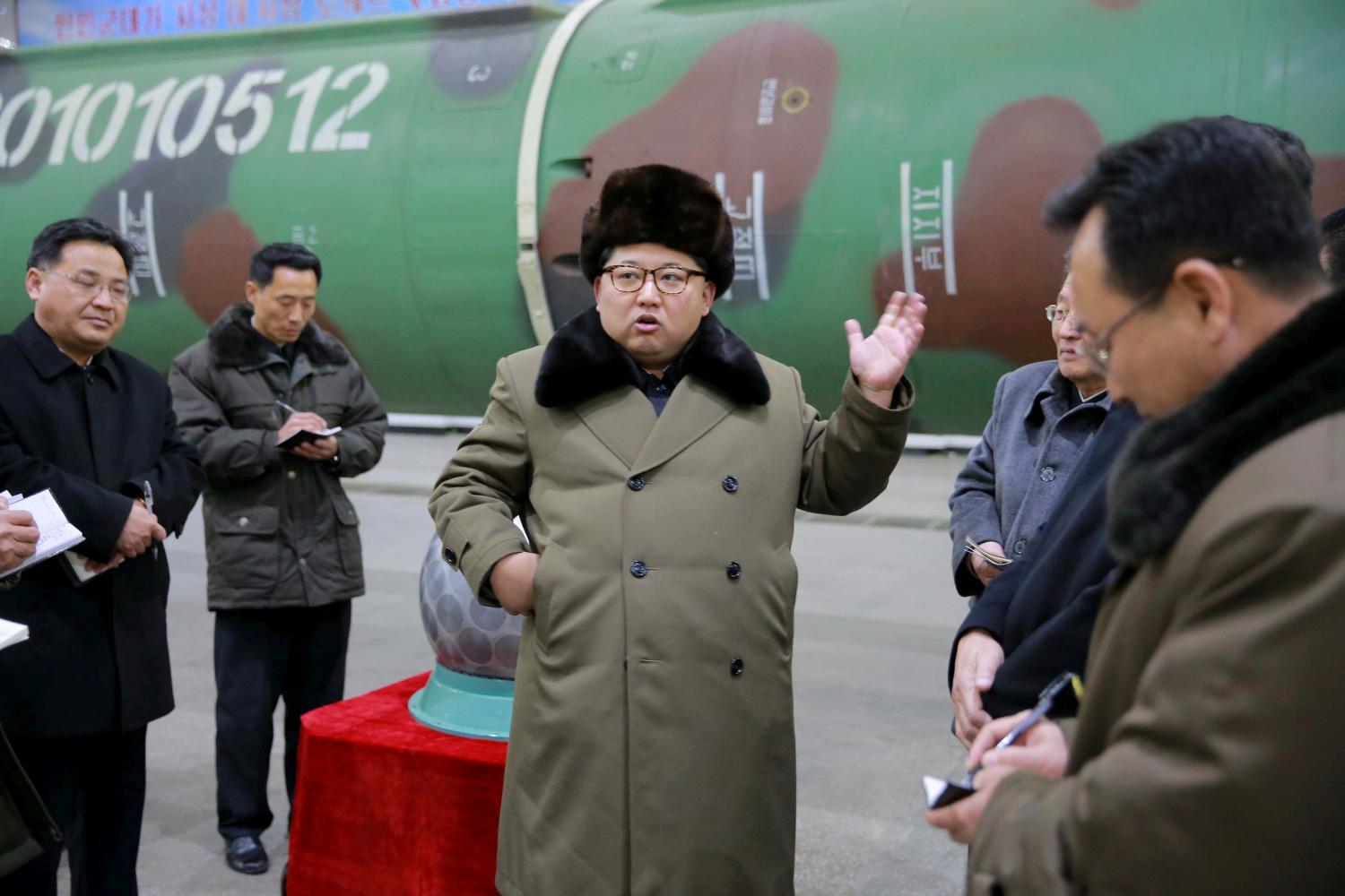 FILE PHOTO - North Korean leader Kim Jong Un meets scientists and technicians in the field of research into nuclear weapons in this undated photo released by North Korea's Korean Central News Agency (KCNA) in Pyongyang March 9, 2016. KCNA/Files via Reuters ATTENTION EDITORS - THIS PICTURE WAS PROVIDED BY A THIRD PARTY. REUTERS IS UNABLE TO INDEPENDENTLY VERIFY THE AUTHENTICITY, CONTENT, LOCATION OR DATE OF THIS IMAGE. FOR EDITORIAL USE ONLY. NO THIRD PARTY SALES. SOUTH KOREA OUT. THIS PICTURE IS DISTRIBUTED EXACTLY AS RECEIVED BY REUTERS, AS A SERVICE TO CLIENTS. - RTX2OQQN