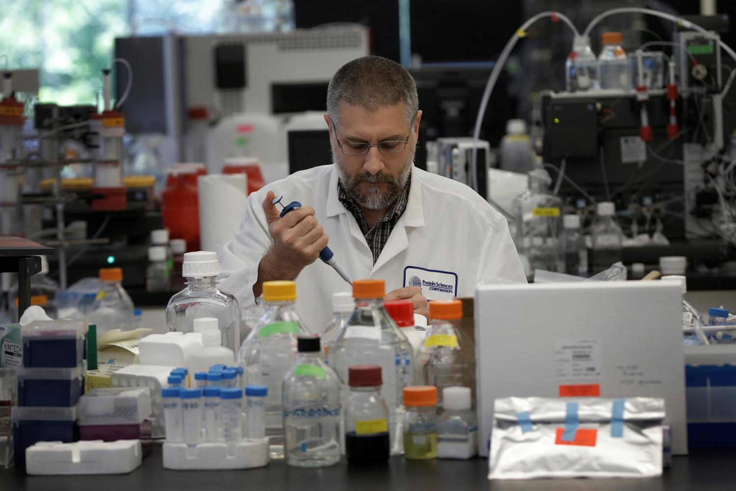 Research scientist Dan Galperin works in the research labaratory at Protein Sciences Inc. where they are working on developing a vaccine for the Zika virus