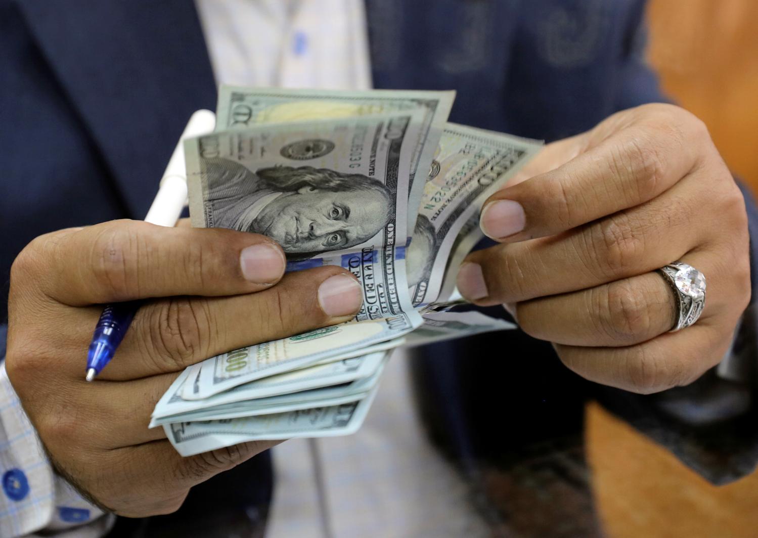 A man counting money