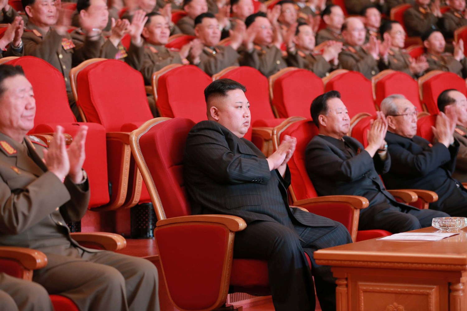 Kim Jong Un watches a performance at the People's Theatre to mark the 70th anniversary of the founding of the State Merited Chorus.