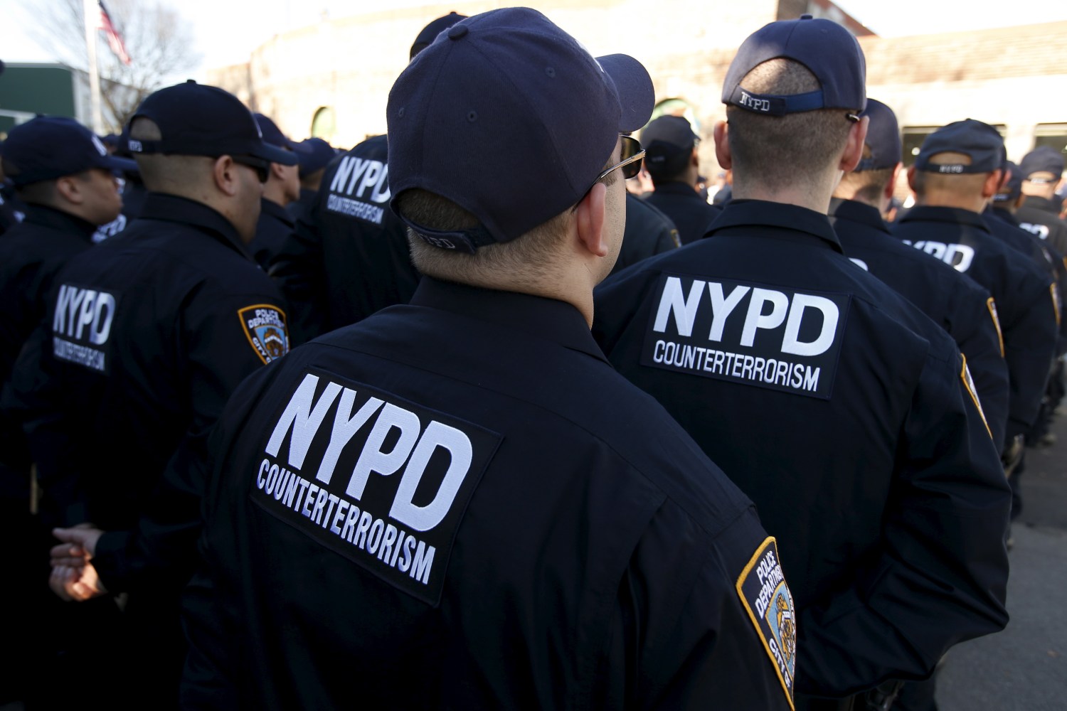 Members of the New York City Police Department (NYPD) newly formed Critical Response Command anti-terrorism unit stand in formation as they gather for their first deployment outside their headquarters on Randall's Island in New York City, November 16, 2015. New York City Police Commissioner Bill Bratton deployed a new counterterrorism team on Monday, three days after the deadly attacks in Paris by militants he says will likely target his city next. REUTERS/Mike Segar - RTS7GB2