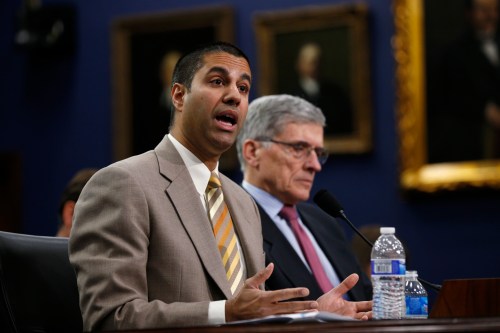 Federal Communications Commission (FCC) Commissioner Ajit Pai (L) and FCC Chairman Tom Wheeler testify at a House Appropriations Financial Services and General Government Subcommittee hearing on the FCC's FY2016 budget, on Capitol Hill